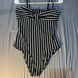 Bodysuit with black and white stripes